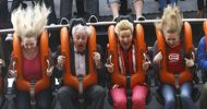 Group of people screaming as they go down the vertical drop on Oblivion in Alton Towers
