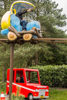 Family on Postman Pat Parcel Post ride in CBeebies Land at Alton Towers