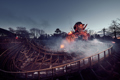 Smoke covering the track of The Wicker man at Alton Towers at night time