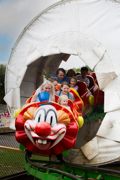 People enjoying ride on Clown Coaster at Camel Creek