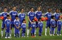 Chelsea FC team lined up on Chelsea FC Stadium pitch