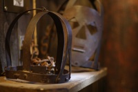 Medieval mask and torture device at The Clink Prison Museum 