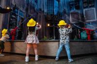 Children enjoy acting as Fire Fighters at KidZania London