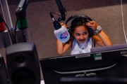 Children acting as Radio DJ's at KidZania London