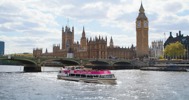 London Eye River Cruiser in front of Houses of Parliament and Big Ben