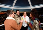 Group of friends enjoying Champagne Experience the London Eye