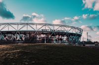 West Ham London Stadium at sunset 