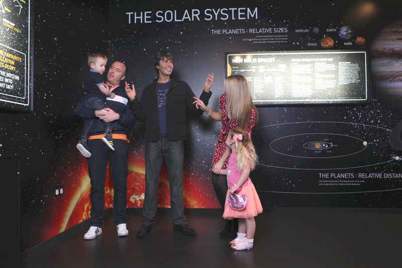 Madame Tussauds Blackpool family with Brian Cox