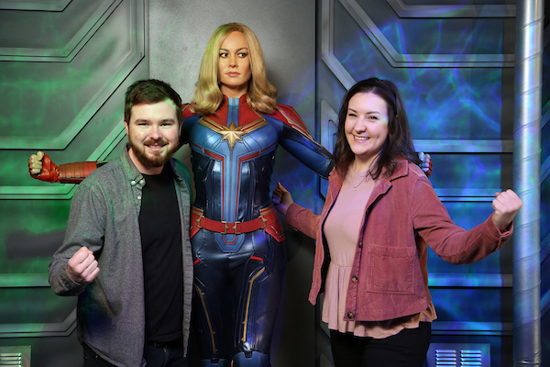Couple posing with Captain Marvel in Marvel Zone at Madame Tussauds Blackpool