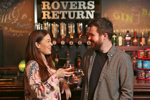 Couple stood in Coronation Street Rovers Return Inn in Madame Tussauds Blackpool 