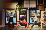 Couple pose with spiderman wax work at Marvel Universe 4D at Madame Tussauds London
