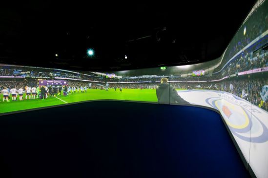 Big 360 degree screen with football pitch playing
