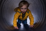 Child climbing through tunnel at SEA LIFE Scarborough