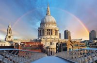 View of St Pauls Cathedral with rainbow surrounding it from bridge