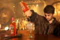 Bar tender pouring drinks at The Red Lion in Blackpool Dungeon
