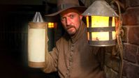  Actor holding lamp performing at The Gunpowder Plot Experience