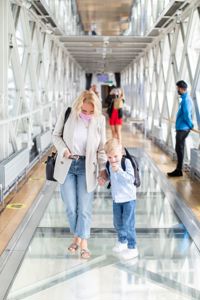 Mother and child walking on Glass Floor at Tower Bridge